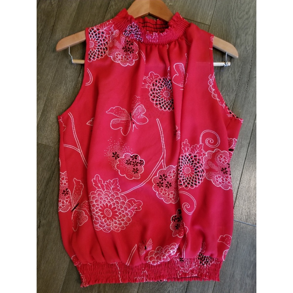 Red sleeveless top